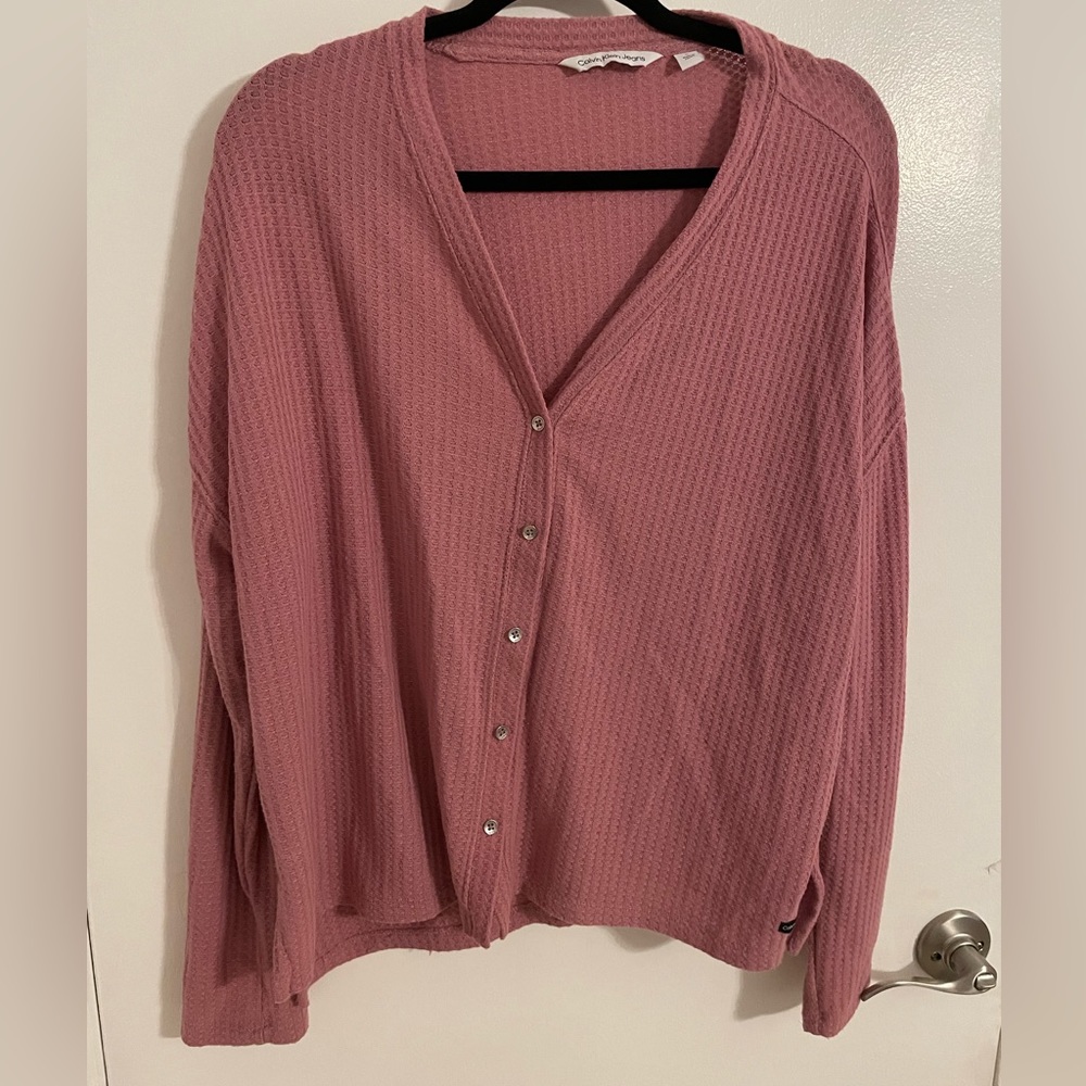 Pink Calvin Klein button up sweater